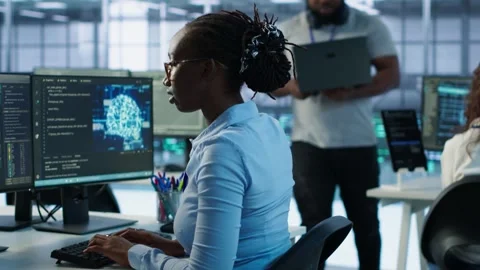 Supervisor overseeing worker using AI system software Stock Footage 319266913