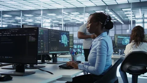 Supervisor overseeing worker using AI system software Stock Footage 319270341