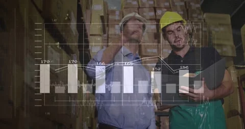 Supervisor pointing up in storage aisle, operator checking tablet while data Stock Footage 333830336