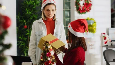 Supervisor surprises worker with gift Stock Photos