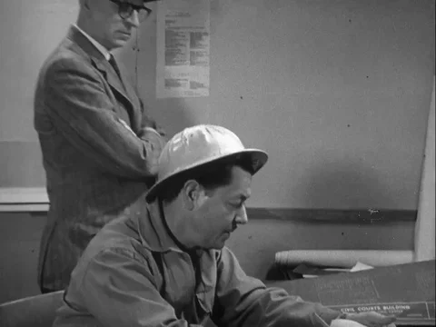 Supervisor talks about the mental status of a worker - 1958 Stock Footage 97228790
