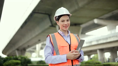 Supervisor woman Engineer or architect Using tablet for checking and maintenance Stock Footage 231660056
