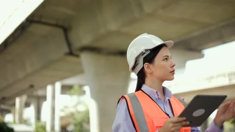 Supervisor woman Engineer or architect Using tablet for checking and maintenance Stock Footage 231660206