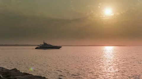 Superyacht sailing into the sunset Stock Footage 60066974