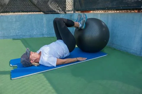 Supine leg curls Stock Photos
