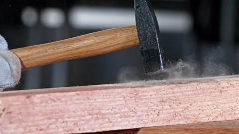 Supper Slow Motion Shot of Hammering a Nail at 1000 fps. Stock Footage 143526694