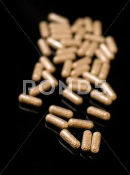 Supplement pills Stock Photos