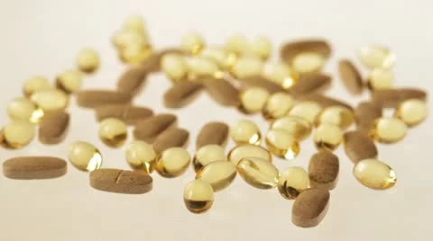 Supplement pills on white surface. Stock Footage 22256187