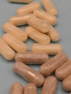 Supplements in capsules Stock Photos