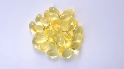 Supplements transparent vitamins capsules. Selective focus. Stock Footage 245376950