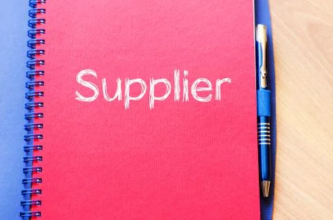 Supplier write on notebook Stock Photos