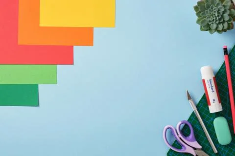 Supplies for paper art hobby: scissors, craft knife, pencil, eraser, colore.. Stock Photos