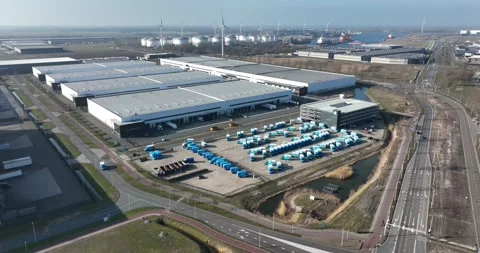 Supply chain distribution logistics depot. Aerial drone view of a commercial Stock Footage 171554997