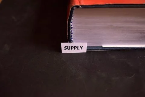 Supply Paper Tab Inserted in Book Pages Symbolizing Distribution System Fotos Stock