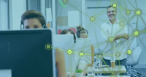 Support agent typing, camera panning right showing manager for business data Stock Footage 332275748