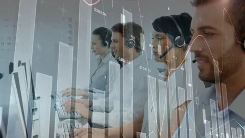 Support agents typing and speaking at monitors, headsets, data feed moving Stock Footage 334036821