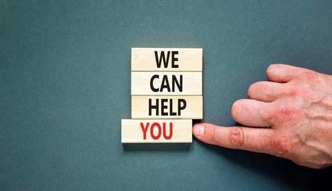 Support and we can help you symbol. Concept words We can help you on wooden b Stock Photos