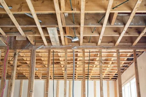 Support beams with wide opened ceiling during a house renovation Stock Photos