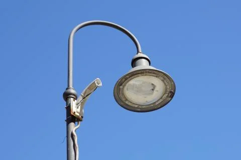 Support for broken security camera on light pole Stock Photos