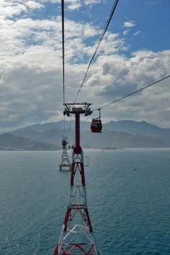 The support of the cable car passing over the sea to the island Stock Photos