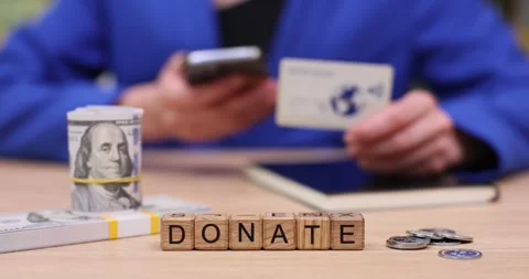 Support a cause with simple donations an... | Stock Video | Pond5