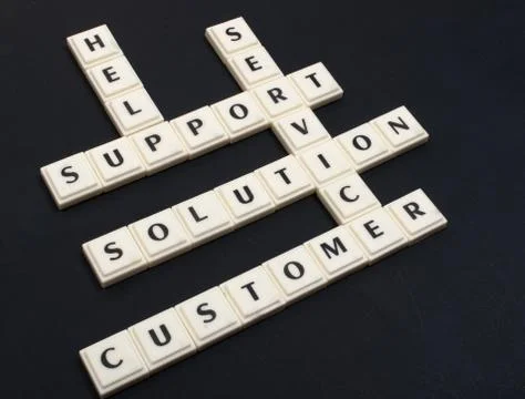Support crosswords on black background Stock Photos