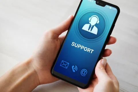 Support, Customer service icon on mobile phone screen. Call center, 24x7 Stock Photos