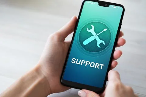 Support, Customer service icon on mobile phone screen. Call center, 24x7 Stock Photos