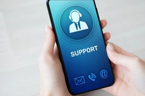 Support, Customer service icon on mobile phone screen. Call center, 24x7 Stock Photos