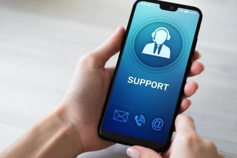 Support, Customer service icon on mobile phone screen. Call center, 24x7 Stock Photos