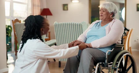 Support, doctor and holding hands with old woman in wheelchair, healthcare and Stock Footage 341097848