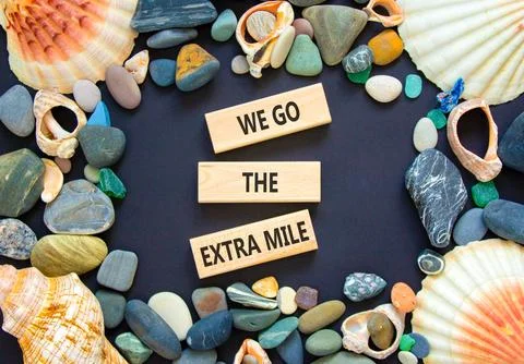 Support, help we go the extra mile symbol. Concept words We go the extra mile Photos