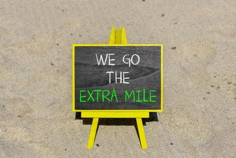 Support, help we go the extra mile symbol. Concept words We go the extra mi.. Stock Photos
