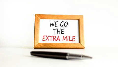 Support, help we go the extra mile symbol. Concept words We go the extra mi.. Stock Photos