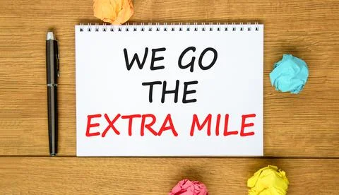 Support, help we go the extra mile symbol. Concept words We go the extra mi.. Stock Photos