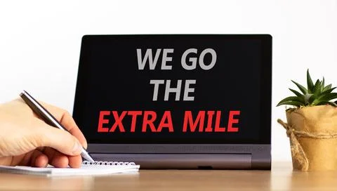 Support, help we go the extra mile symbol. Concept words We go the extra mi.. Stock Photos