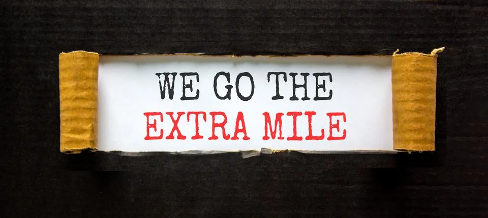Support, help we go the extra mile symbol. Concept words We go the extra mi.. Stock Photos