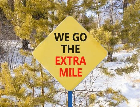 Support, help we go the extra mile symbol. Concept words We go the extra mi.. Stock Photos