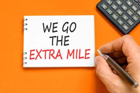 Support, help we go the extra mile symbol. Concept words We go the extra mi.. Stock Photos