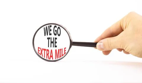Support, help we go the extra mile symbol. Concept words We go the extra mile Stock Photos