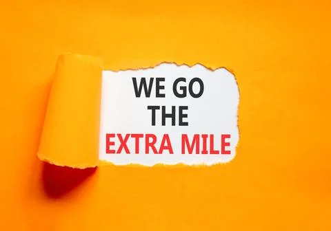 Support, help we go the extra mile symbol. Concept words We go the extra mi.. Stock Photos