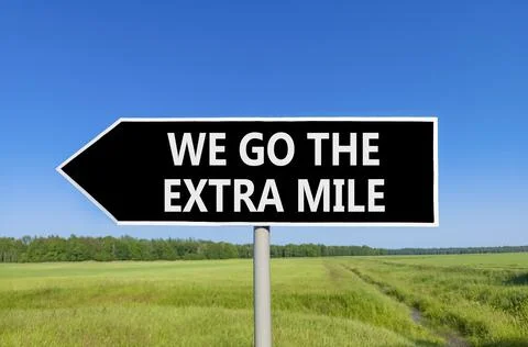 Support, help we go the extra mile symbol. Concept words We go the extra mi.. Stock Photos