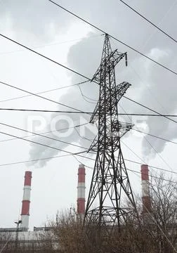 Support of high-voltage power lines, pipes of a thermal power plant. Vertica Stock Photos