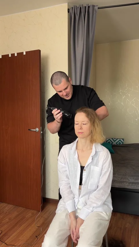 Support at Home: Man Helps Partner Shave Head During Chemotherapy Stock Footage 313751294