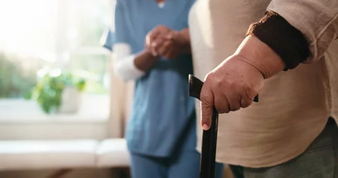 Support, nurse or old person with walking stick, helping hand or muscle recovery Stock Footage 341101739