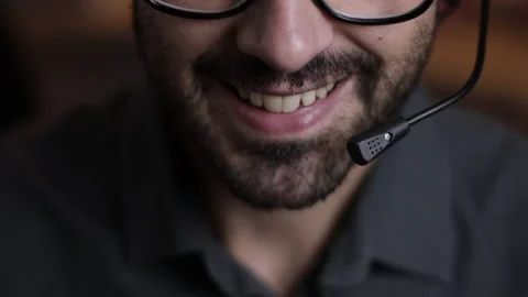 Support operator is talking with headset microphone. Call center operator Stock Footage 161278370