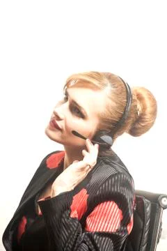 Support phone operator in headset at workplace 스톡 사진