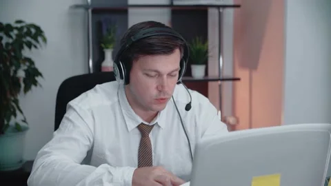 The support representative speaks confidently with the webcam. Stock Footage 145092563