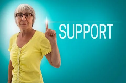Support touch screen is shown by Senior Woman concept Stock Photos
