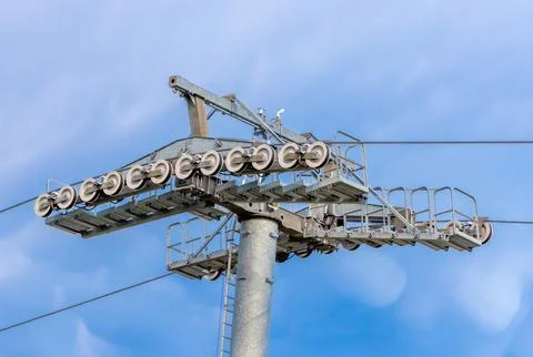 An support tower and roller system for a cable car or ski lift Stock Photos